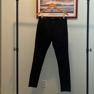 Black Vigoss jeans size 29 skinny with distressing and raw edges